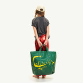 Green Manifesto Tote Bag MODEL FRONT