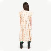 Orange Otter Dress MODEL BACK