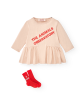 Rose Wildebeest Baby Dress MODEL FRONT